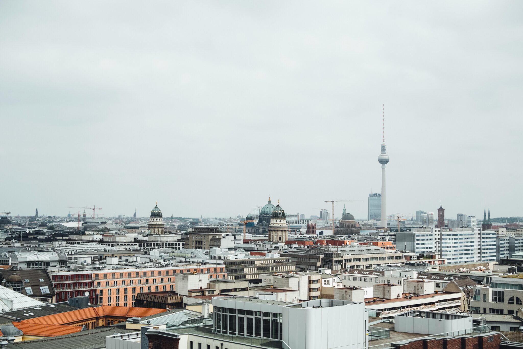 Stunning aerial view of Berlin cityscape featuring the iconic Fernsehturm tower.